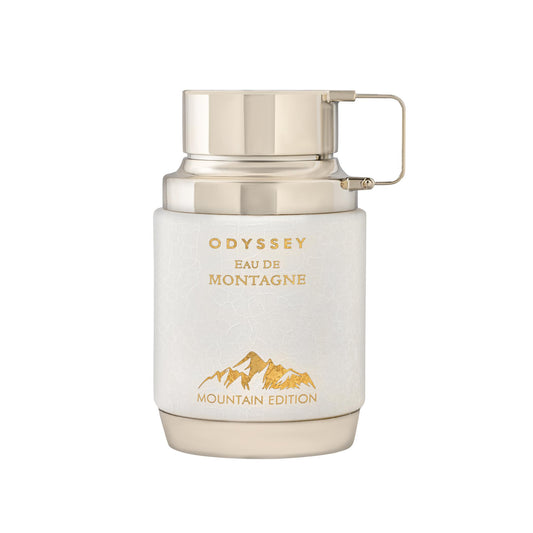 Perfume bottle labeled 'Odyssey Eau de Montagne' with mountain design on a white background